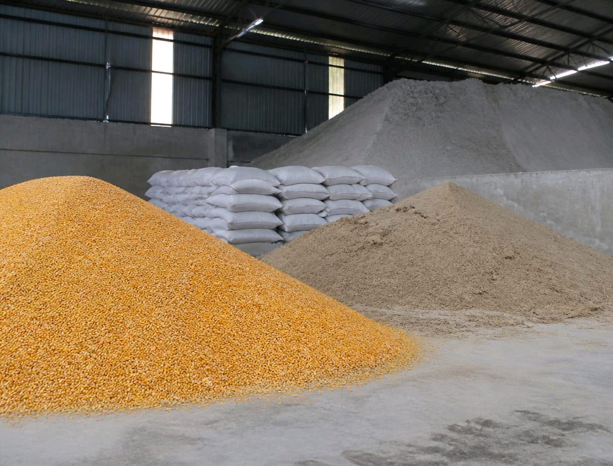 Maize, milled raw materials and stacked bags stored inside an Autumn Grains warehouse